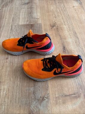 Nike Women’s Bright Orange Knit Sneakers with Black Details